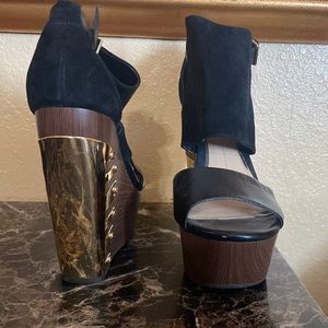 Black leather and suede top with gold details